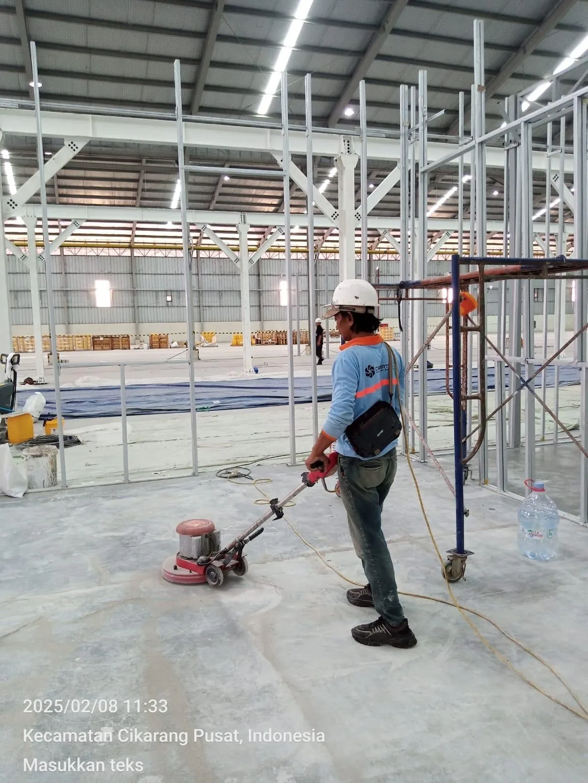 Persiapan lantai beton proyek industri